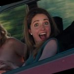 Kristen Wiig Covers Nude Tits in Car